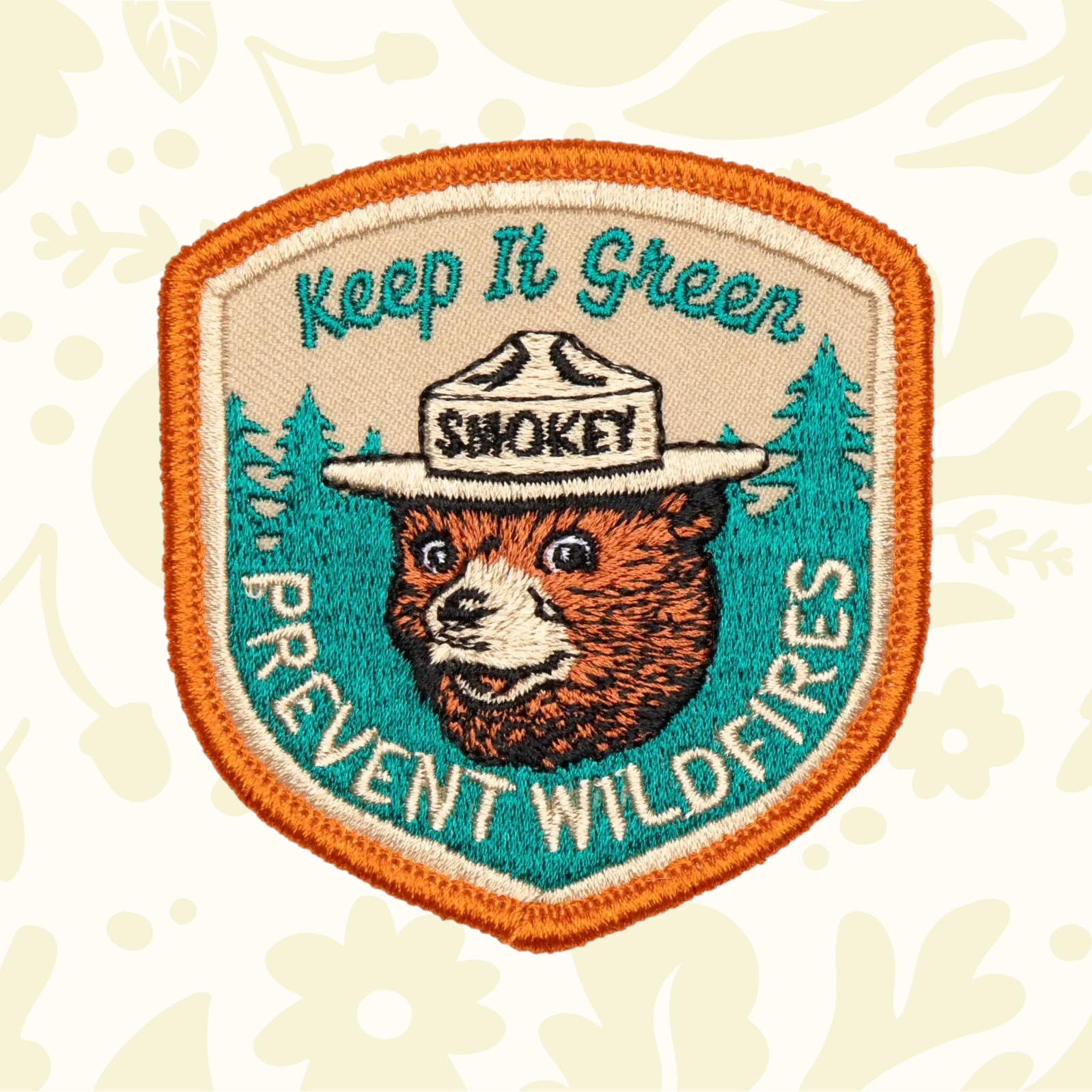Forager Provisions LTD Smokey Bear Keep It Green embroidered patch with orange border and forest green details.