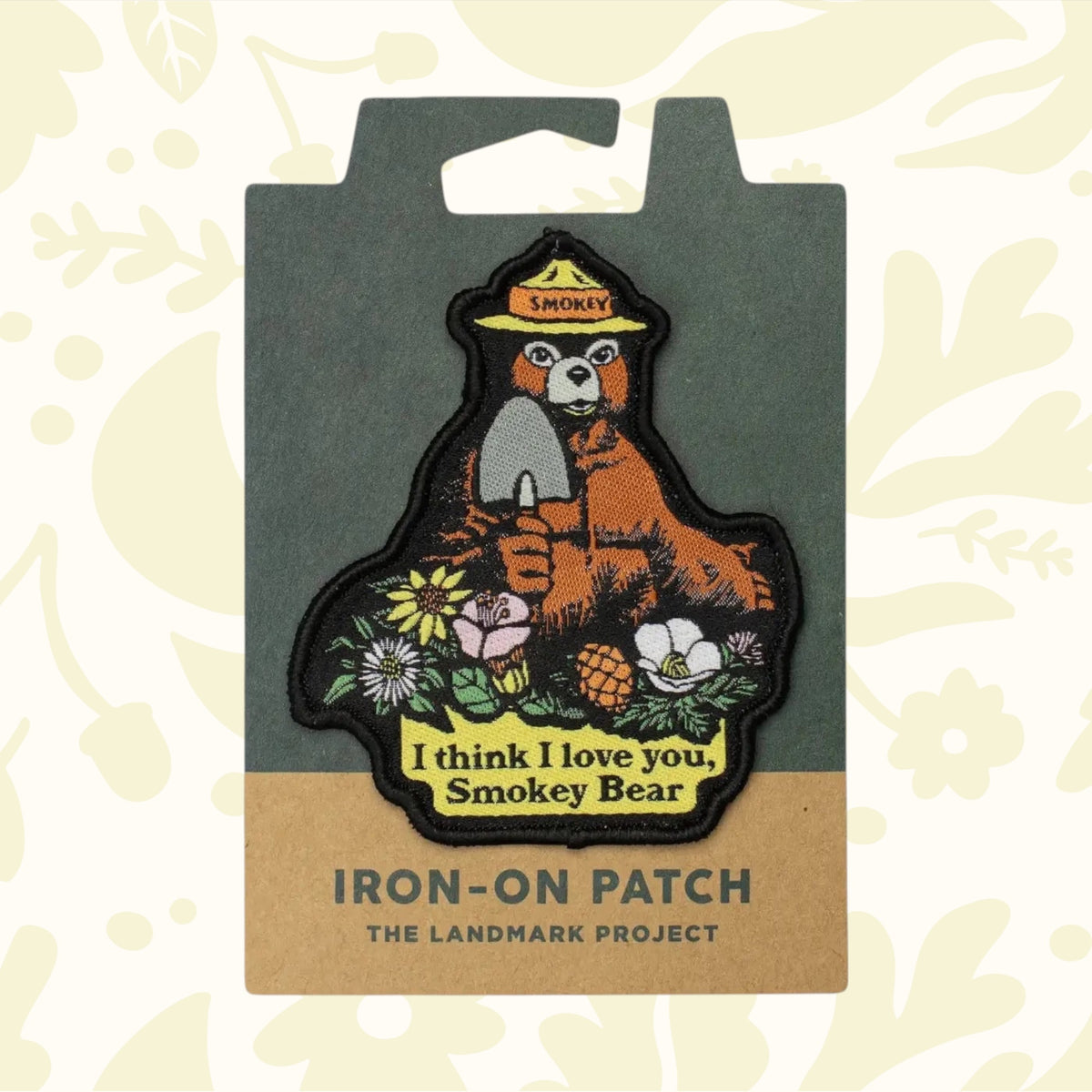 Forager Provisions LTD embroidered Smokey Bear iron-on patch with floral design and I Love You Smokey text on card