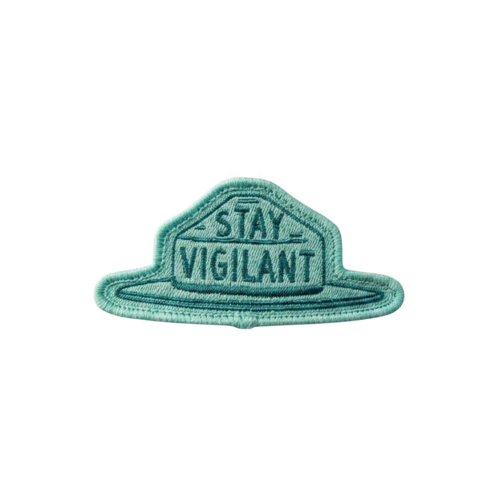 Forager Provisions LTD iron-on Smokey Bear ranger hat patch in teal with the text Stay Vigilant
