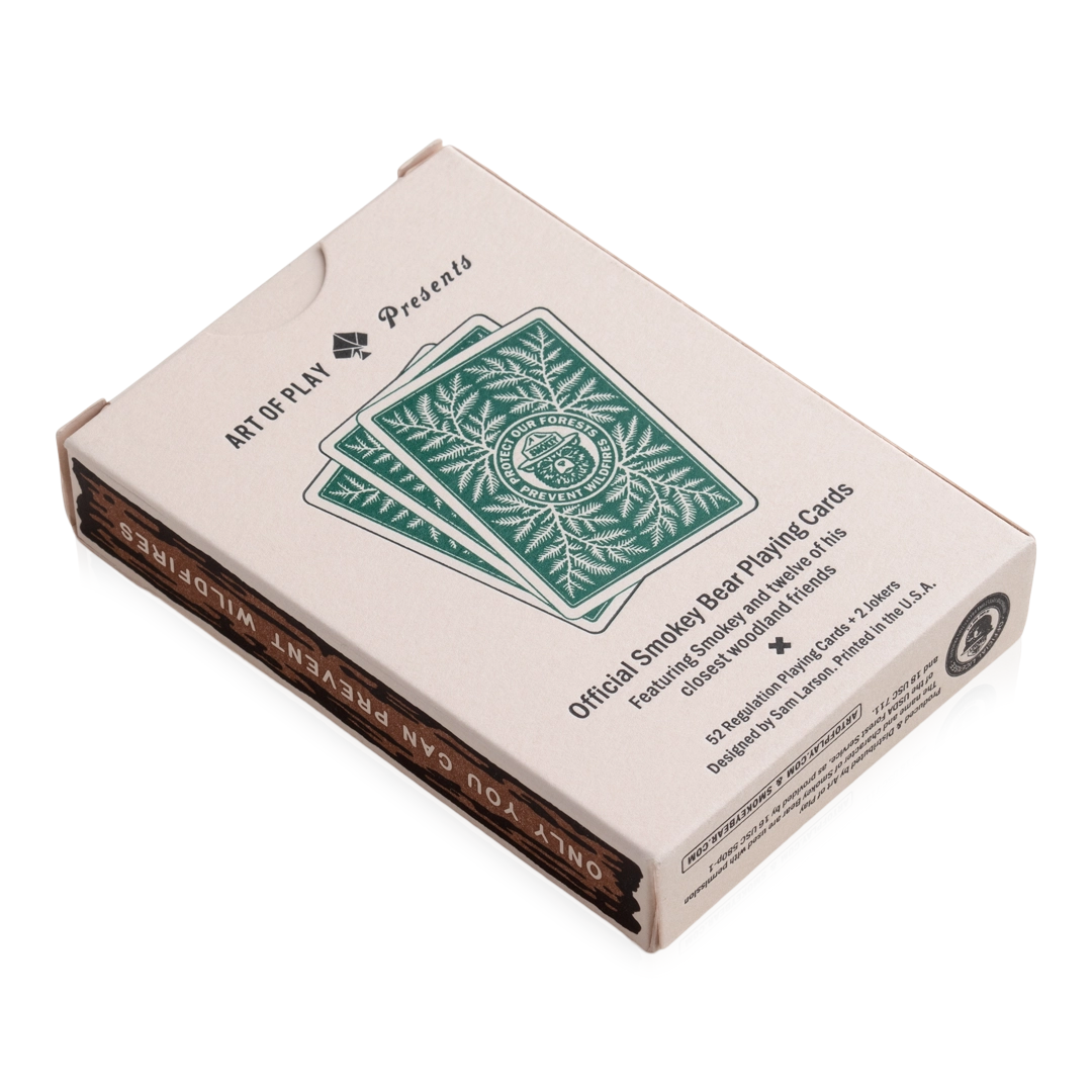 Forager Provisions LTD Smokey Bear playing cards deck in a cream box with green forest-themed illustrations