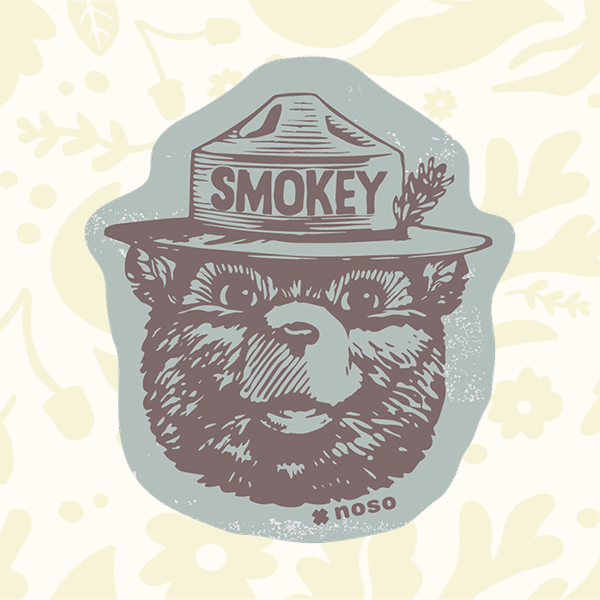 Forager Provisions LTD Smokey Bear vintage logo peel-and-stick repair patch for outdoor gear on a floral background