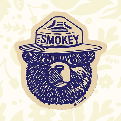 Forager Provisions LTD Smokey Bear vintage logo peel-and-stick repair patch in navy blue on a cream background