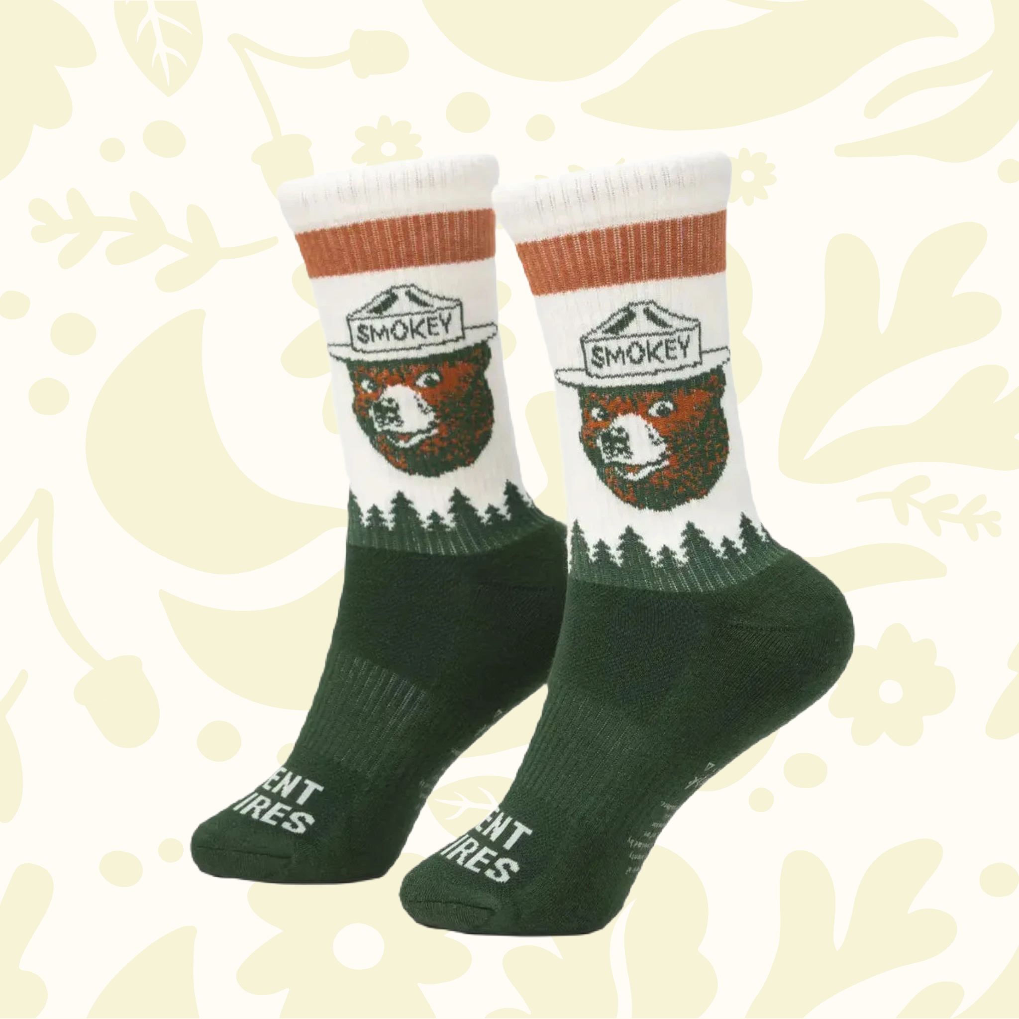 Forager Provisions LTD Smokey Bear organic cotton crew socks featuring a forest tree scape and Smokey Bear logo.