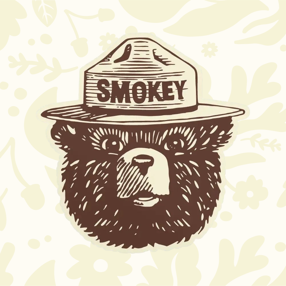 Forager Provisions LTD Smokey Bear logo vinyl sticker featuring a brown illustrated bear face wearing a ranger hat.