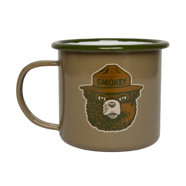 Forager Provisions LTD olive enamel mug featuring a Smokey Bear graphic with a green rim and handle