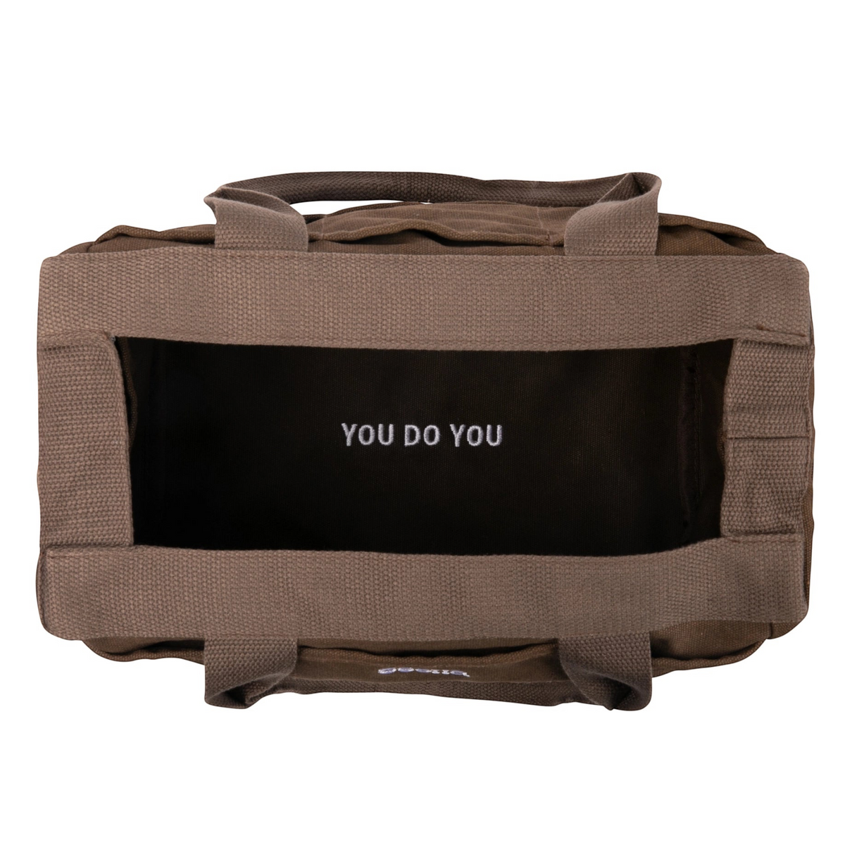 Top view of Soolla Studio Pottery Artist Bag in Coffee Bean, empty, with YOU DO YOU quote at bottom. Soolla branding.