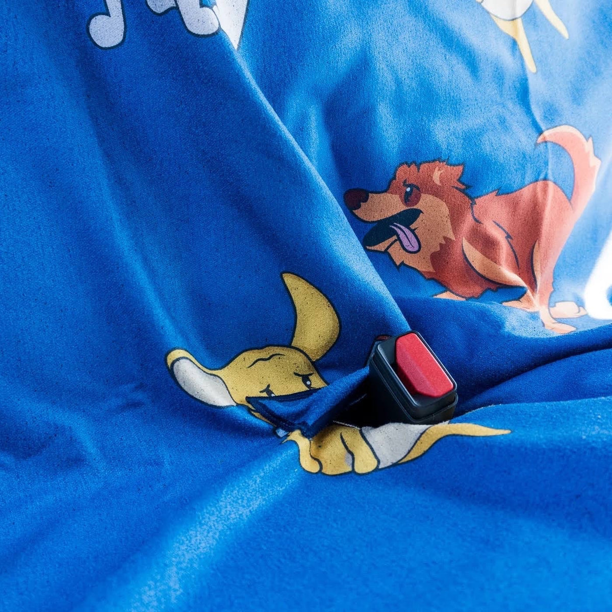 Forager Provisions LTD Sprints Hair Of The Dog blue towel used as a car seat cover with a seatbelt buckle slot
