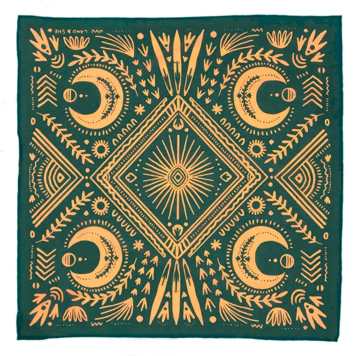 Forager Provisions LTD Stay Steady cotton bandana in dark green with a gold celestial moon and sun pattern.