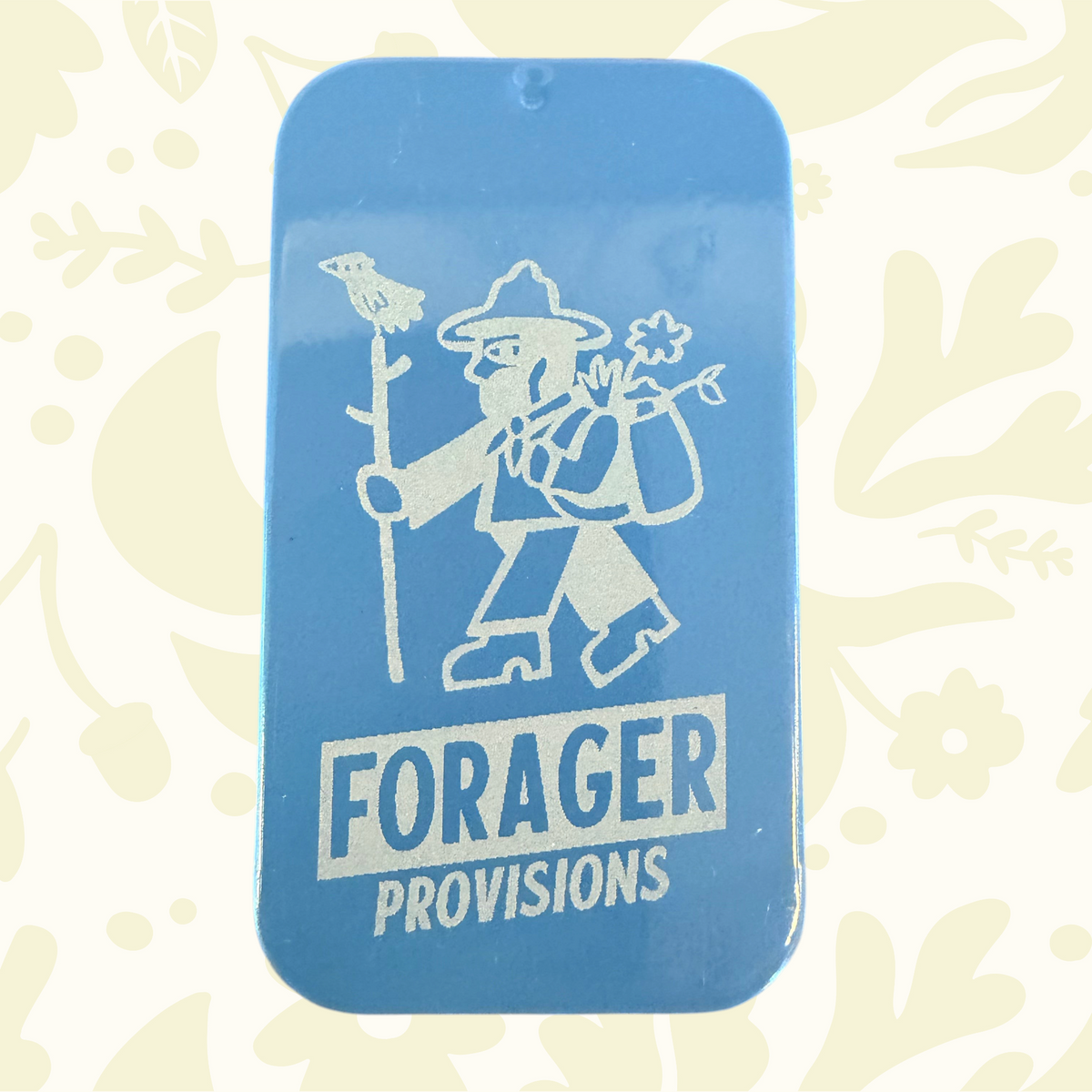Forager Provisions LTD steel blue metal mini stash tin featuring a Forager logo and character graphic.