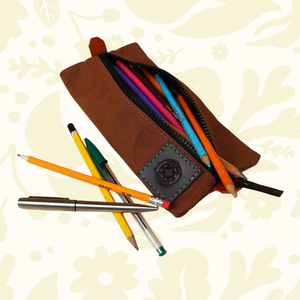 Forager Provisions LTD Journeyman Craft tan canvas pencil case filled with colourful pens and pencils