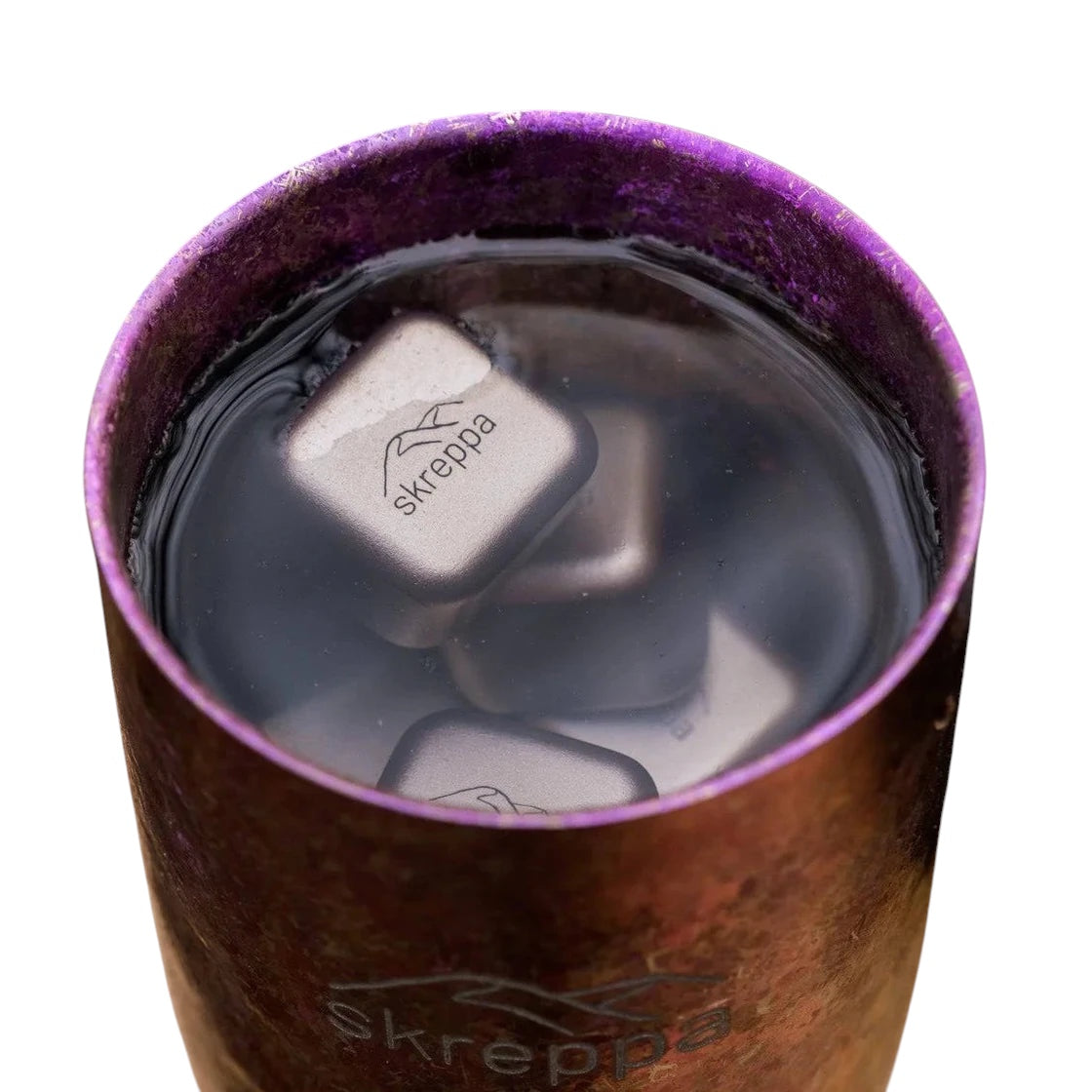 Forager Provisions LTD Skreppa titanium ice cubes cooling a drink in a metallic purple tumbler