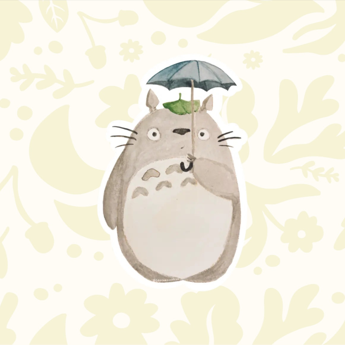Forager Provisions LTD matte vinyl Totoro sticker featuring the character holding an umbrella on a wooden background