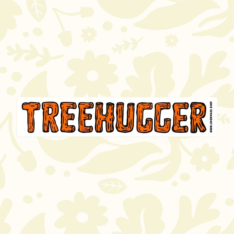 Forager Provisions LTD Tree Hugger vinyl sticker with orange wood-textured lettering on a cream floral background