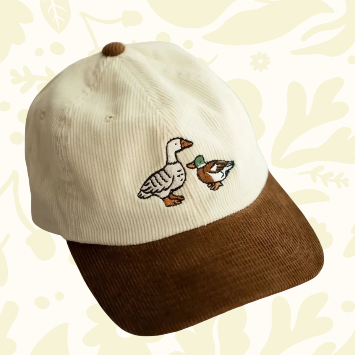 Forager Provisions LTD two-tone cream and brown corduroy cap featuring an embroidered duck and mallard design.