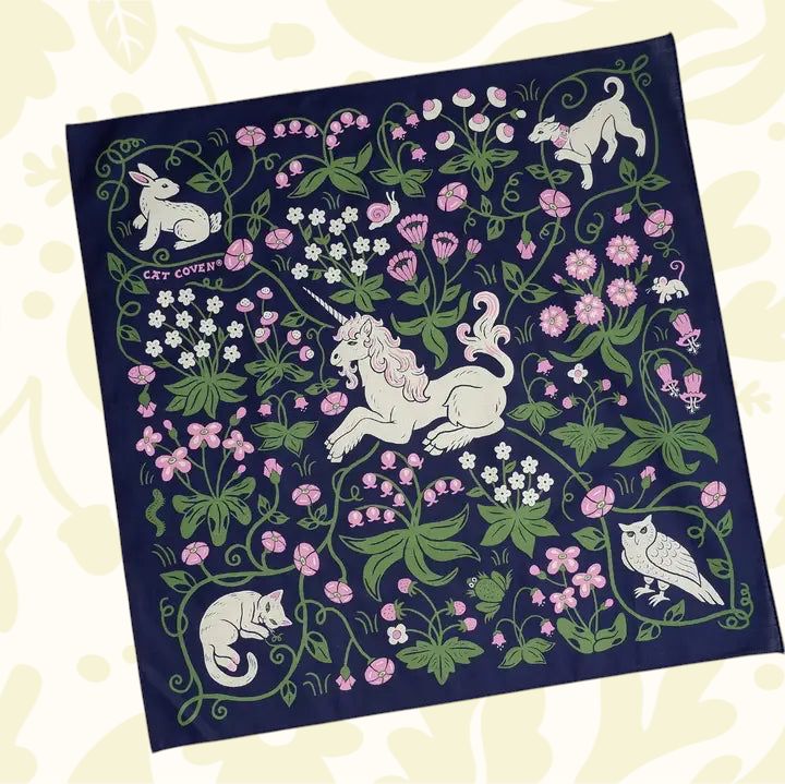 Forager Provisions LTD Cat Coven cotton bandana featuring a whimsical unicorn, flowers, and woodland animals.