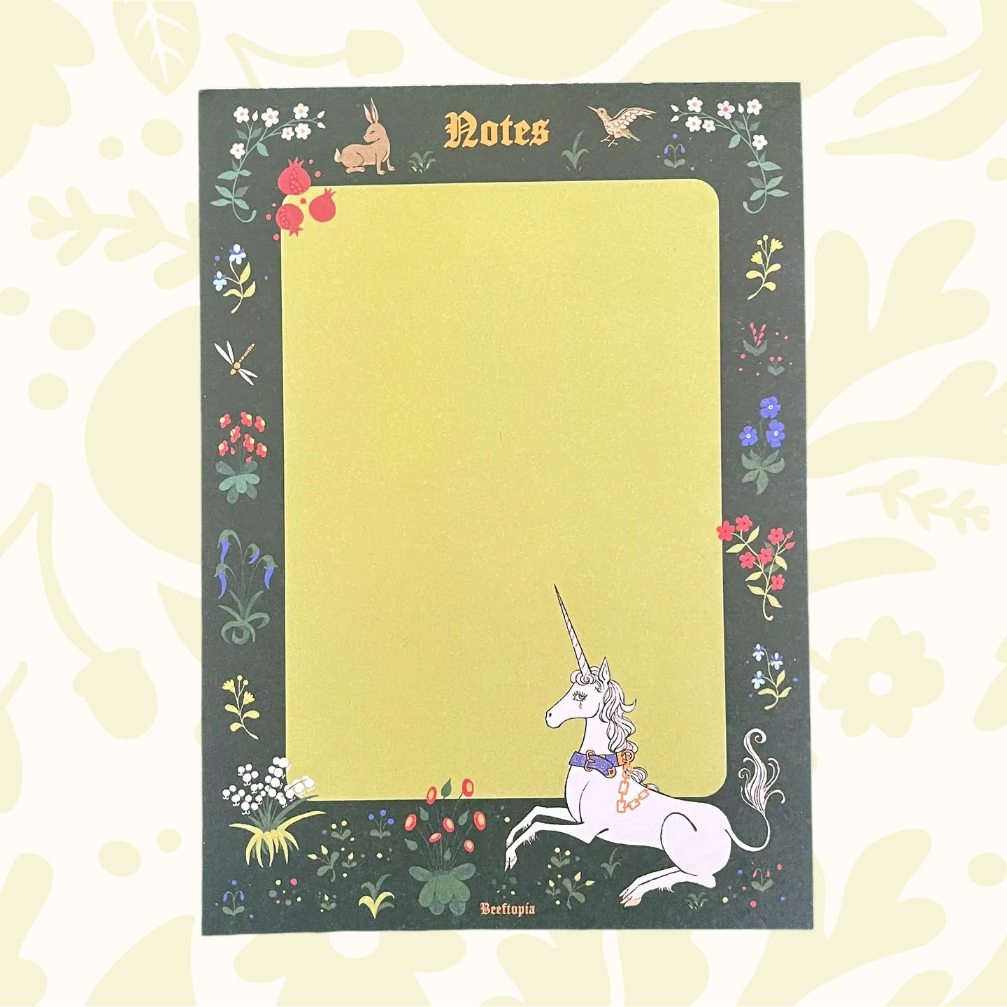Beeftopia Unicorn Tapestry Notepad A6, “Notes,” floral border, cute rabbit, bird & unicorn art in bottom right corner.
