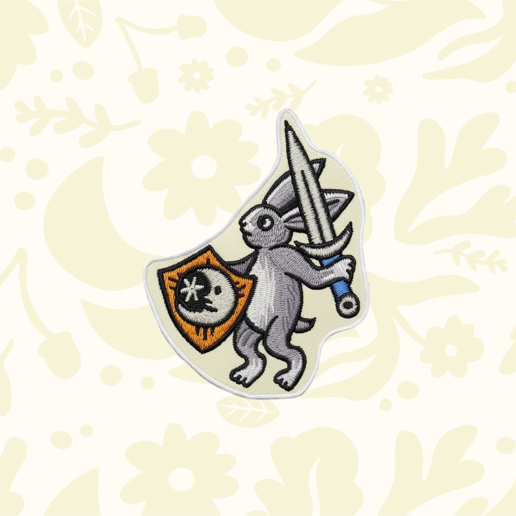 Forager Provisions LTD Cat Coven embroidered patch featuring a medieval warrior rabbit with a sword and shield.