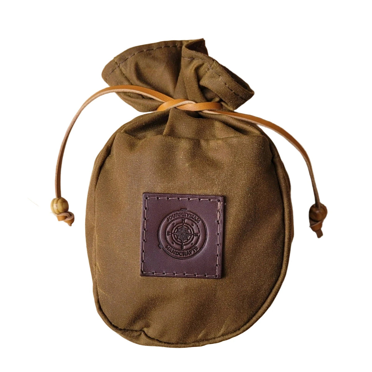 Forager Provisions LTD Journeyman Handcraft tan brown waxed canvas coffee pouch with a leather tie cord closure.