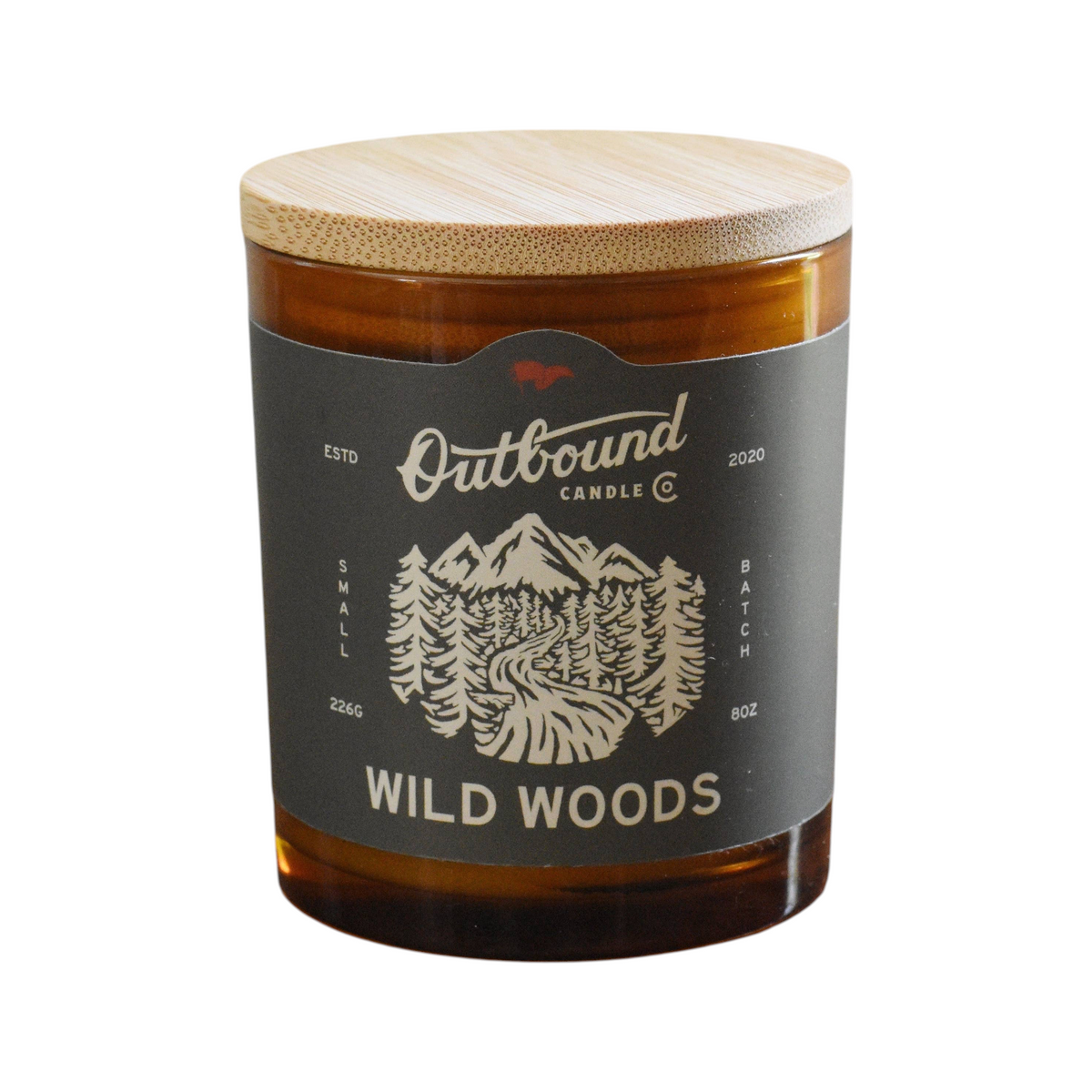 Forager Provisions LTD Outbound Candle Co Wild Woods soy candle in amber glass jar with a bamboo lid.