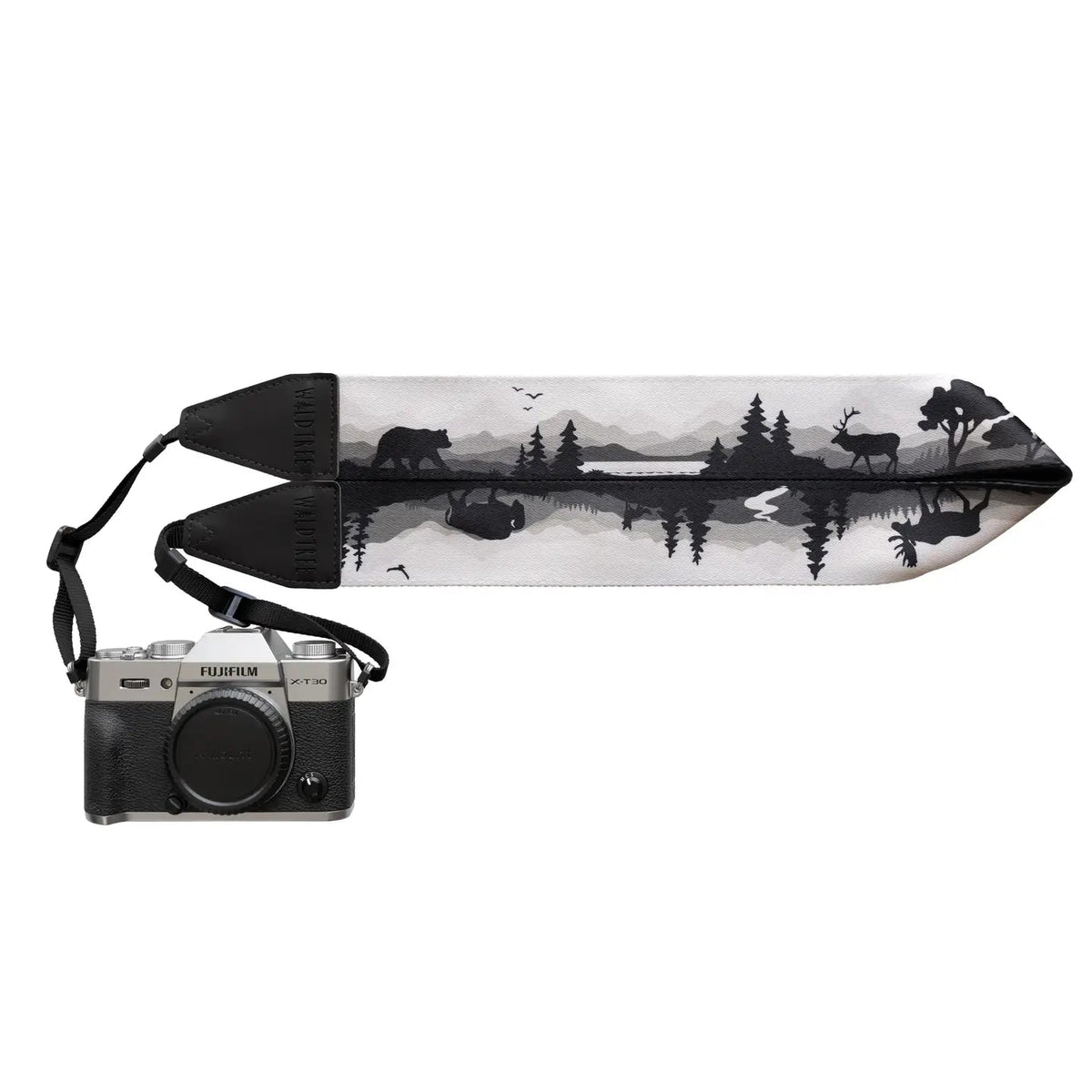 Forager Provisions LTD Wildtree camera strap featuring a black and white forest wildlife print attached to a camera