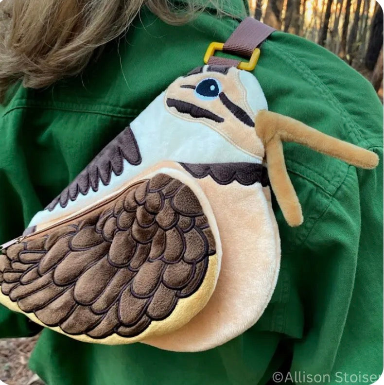 Forager Provisions LTD American Woodcock plush crossbody bag with embroidered details and brown strap worn on shoulder