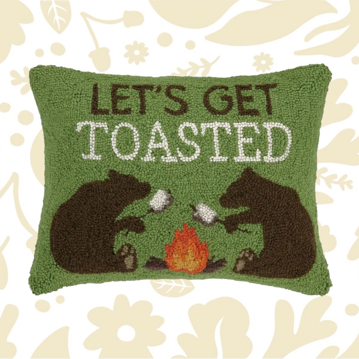 The Peking Handicraft Lets Get Toasted Wool Hook Cushion is a green wool accent pillow adorned with two camping bears toasting marshmallows over a campfire, accompanied by the text "LET'S GET TOASTED.