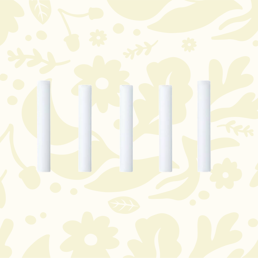 Forager Provisions LTD pack of five white cotton core ink reservoirs for The Wren Pen on a dark wood surface
