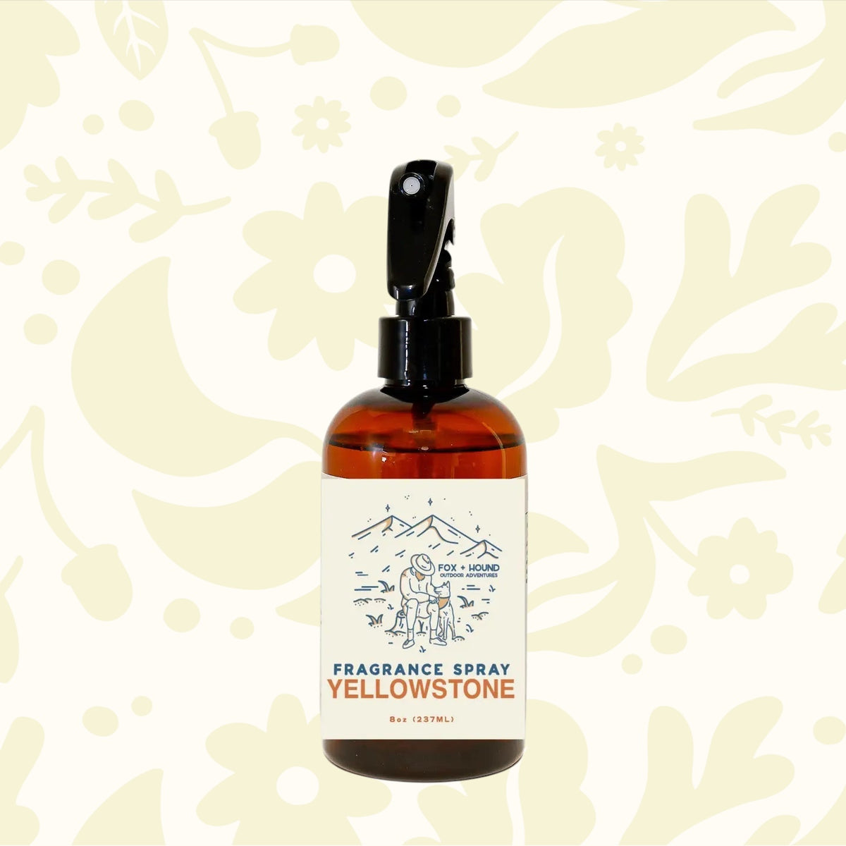 Forager Provisions LTD Fox + Hound Yellowstone dog cologne in an 8 oz amber spray bottle with mountain illustration.