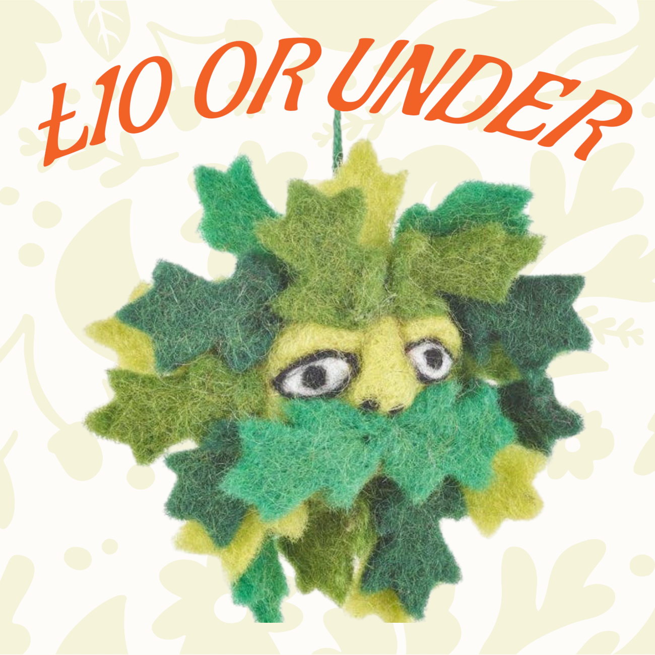 Handmade felt face ornament with green leaf border and “£10 OR UNDER” label—unique craft gift, budget-friendly decor.