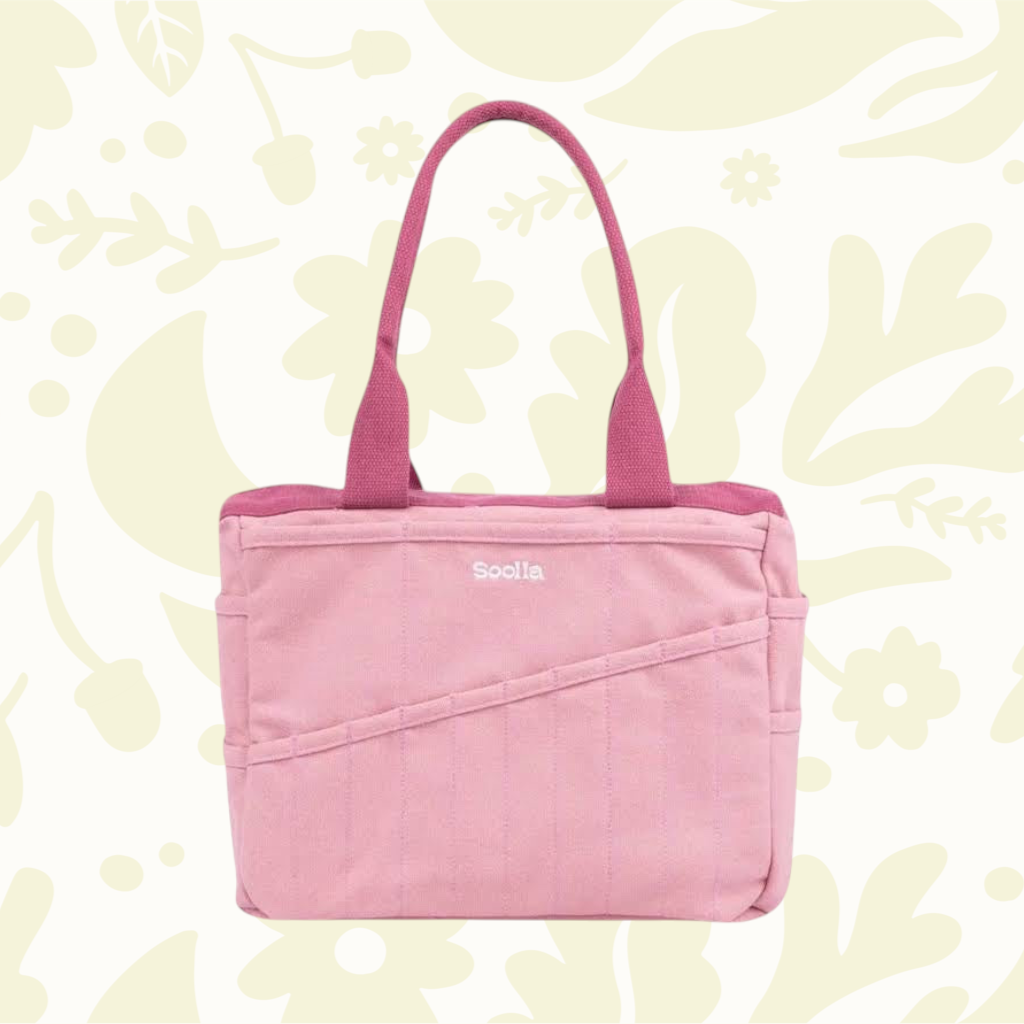 Soolla Studio Pottery Artist Bag in Desert Rose Pink with floral design and angled studio pockets for stylish organization.